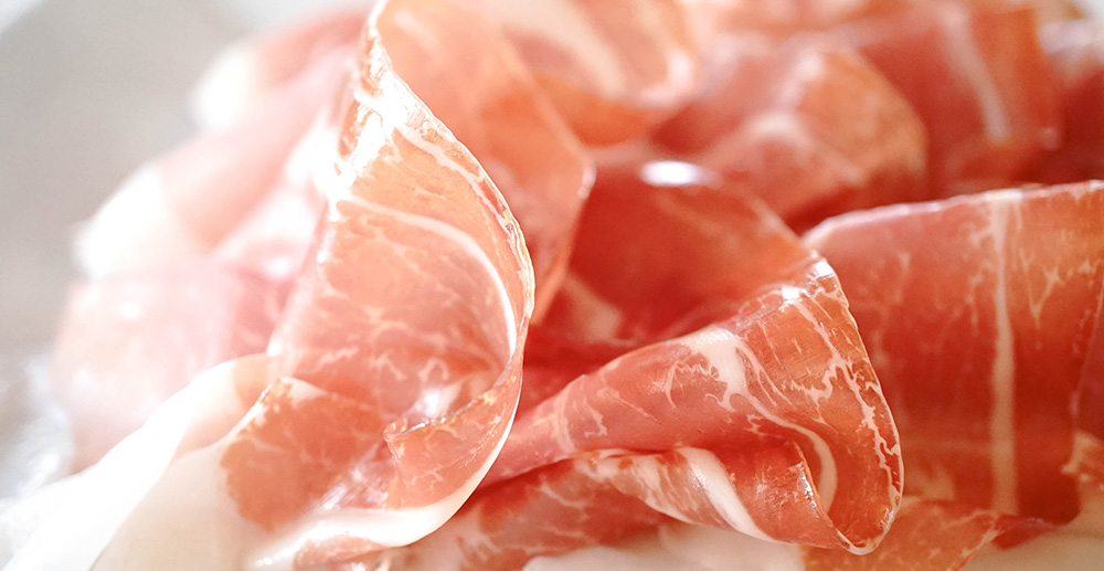 Prosciutto Crudo di Parma DOP — porcja i noga